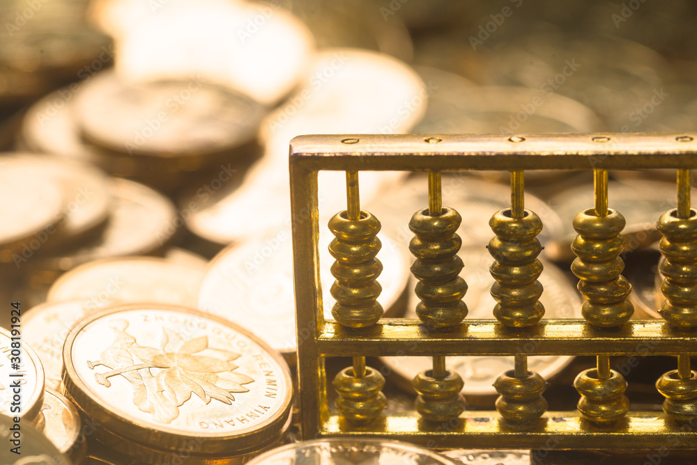 Εκτύπωση καμβά A gold abacus was placed on the background of the pile of COINS