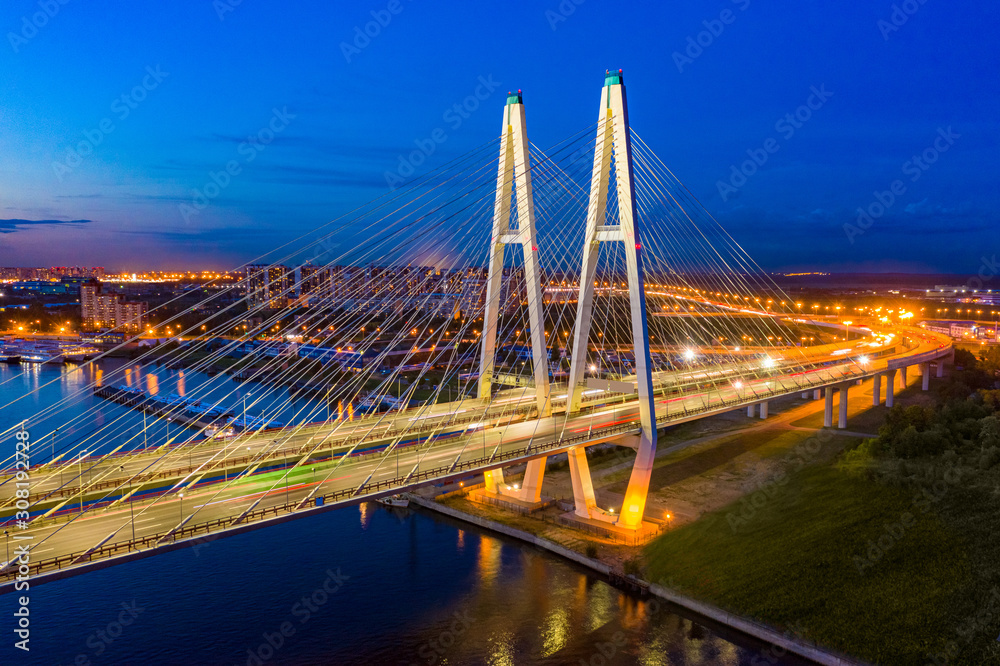 Obraz premium St. Petersburg. Russia. White Nights. Big Obukhov bridge. Cable-stayed bridge in Petersburg. Water excursions along the Neva. Canals of Saint Petersburg. Trip to Russia. White nights over the Neva.