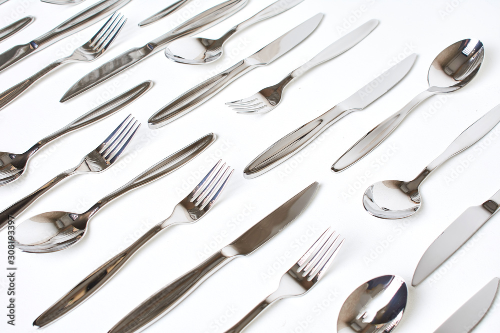 Set of forks on grey background. Forks as background Set of forks on grey background. Forks as background