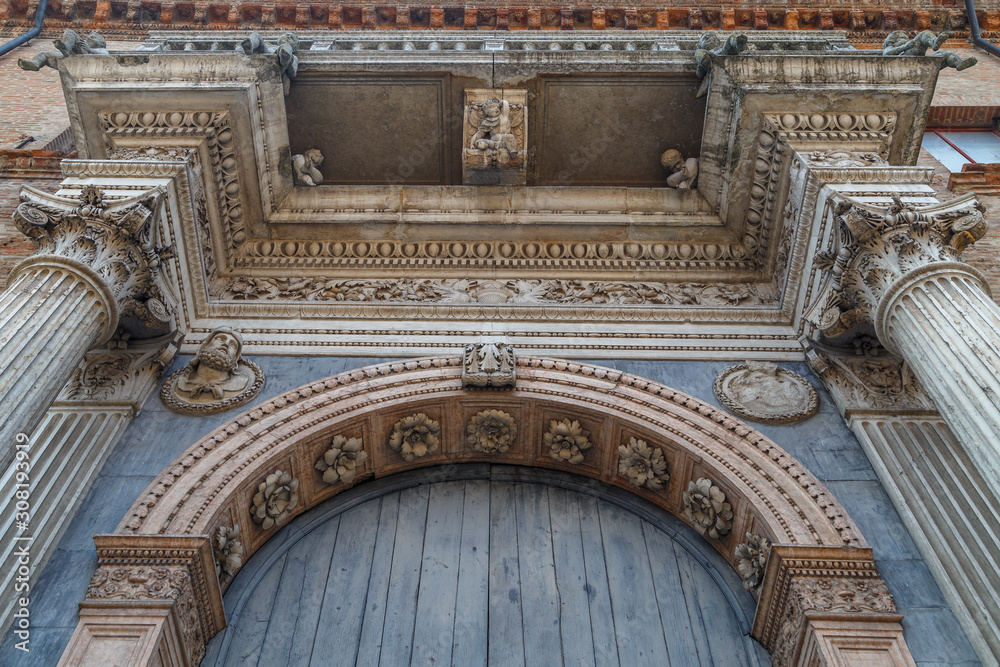 Church facade in the historic centre of Ferrara, Italy