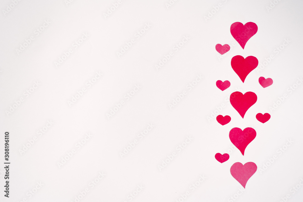 Border of red and pink hearts on a white background. Feast of love Valentine's Day