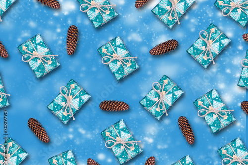 New Year's gifts and cones on a blue background. . New Year. Christmas background.