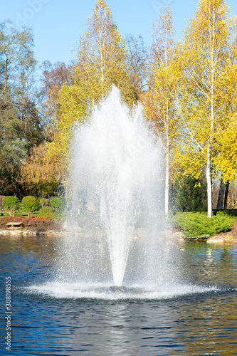 A fountain on a pond