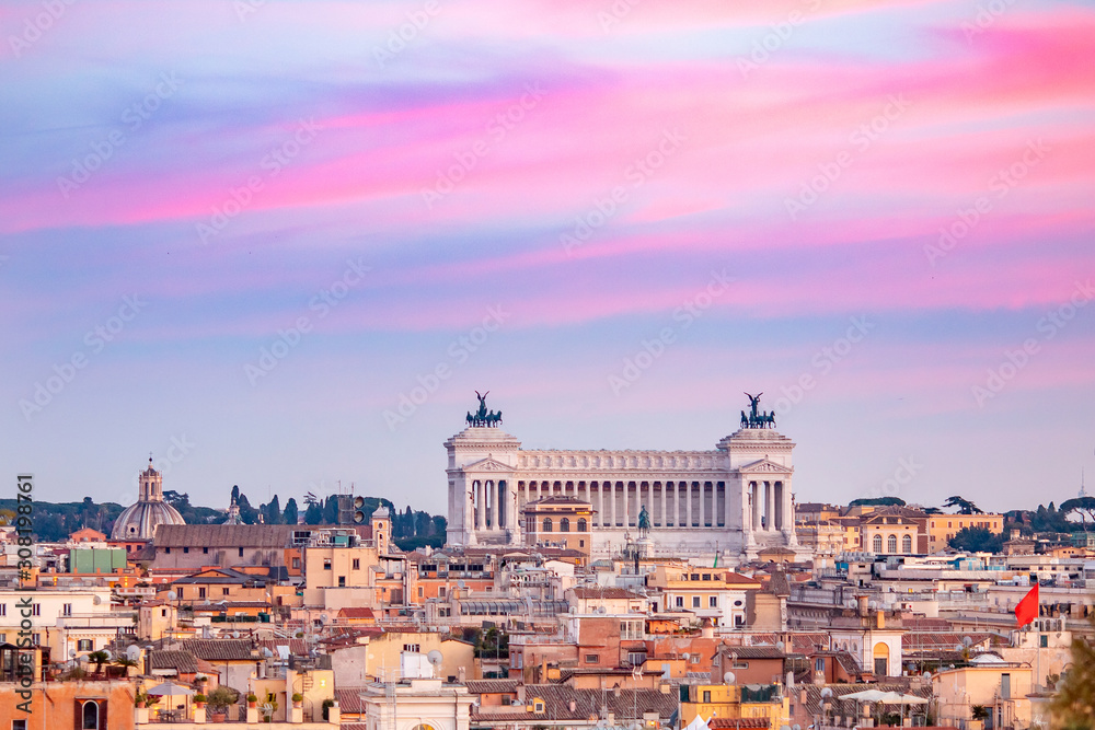 Panoramic view aerial city Rome from square of Venice rooftop sunset
