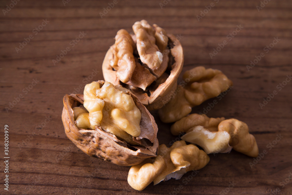 dried fruits, open nuts on wood dried fruits, open nuts on wood