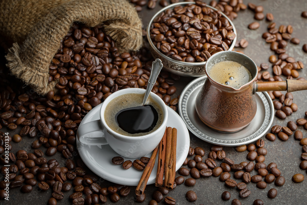 Black coffee on an old background in a cup Black coffee on an old background in a cup