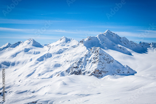 Winter panoramic view of the snowy high mountains of Elbrus in the Russia