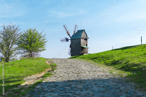 Traditional wooden windmill in Ukraine, Pyrogovo, Kyiv photo