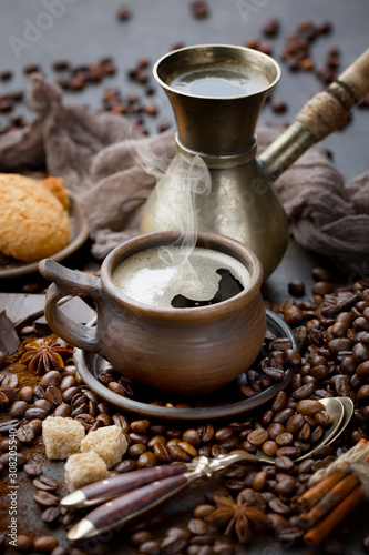 Black coffee on an old background in a cup