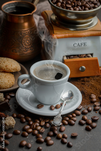 Black coffee on an old background in a cup