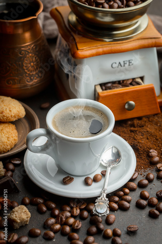 Black coffee on an old background in a cup © vizafoto