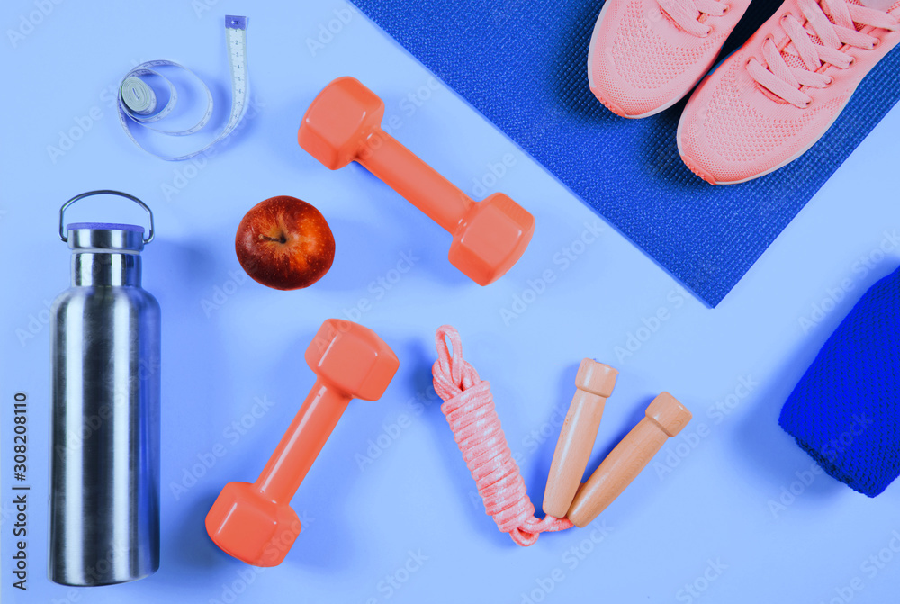 Flat lay shot of sneakers on trendy blue background. Flat lay shot of sneakers on trendy blue background.