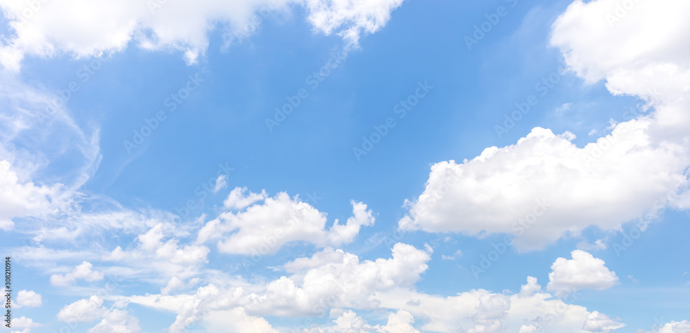 Panorama or panoramic photo of blue sky and white clouds or cloudscape. Panorama or panoramic photo of blue sky and white clouds or cloudscape.
