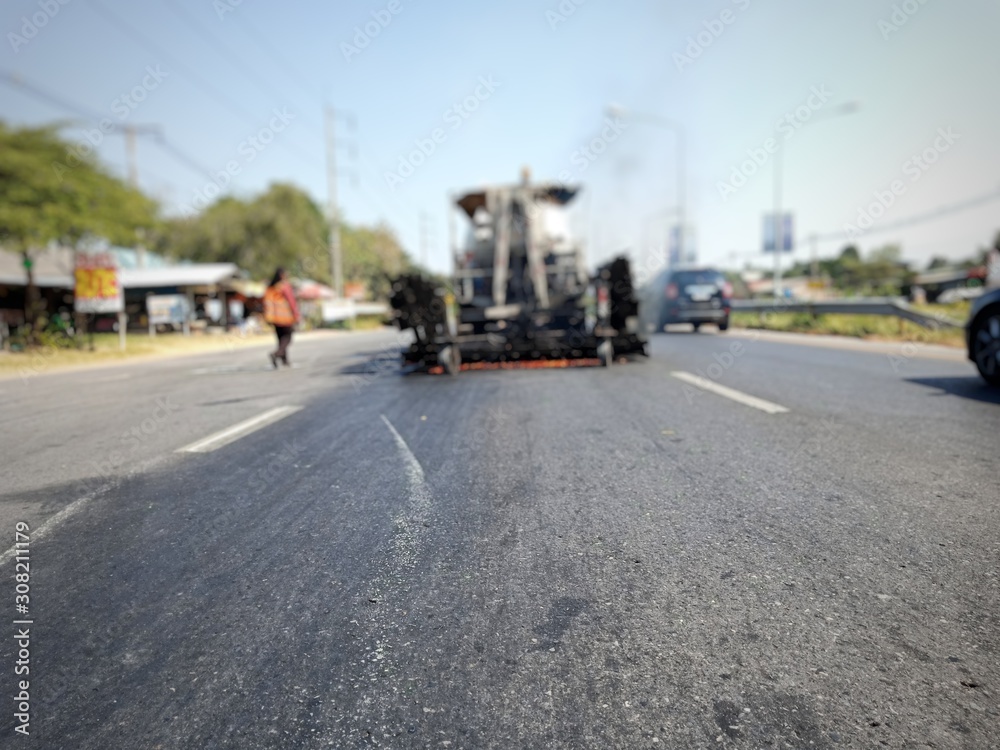 Road construction With the process of burning the road surface Then recycle (blurred images)