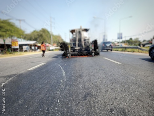 Road construction With the process of burning the road surface Then recycle (blurred images)