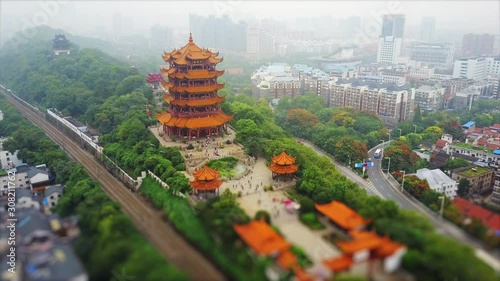 wuhan city day time famous yellow crane temple traffic road aerial panorama 4k tilt shift china photo