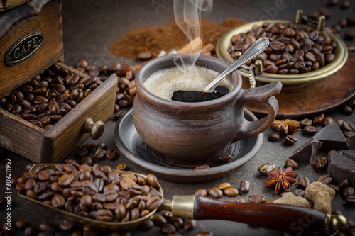 Black coffee on an old background in a cup