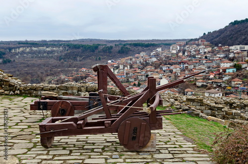 Photography Ancient medieval wooden Crossbow and Catapult in Tsarevets fortress on a backgro