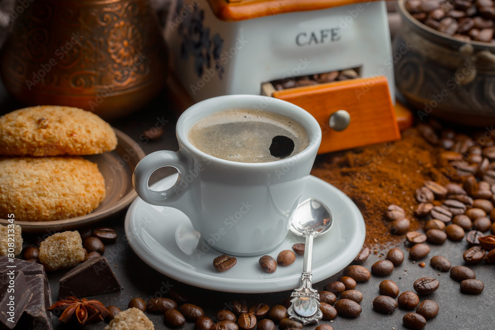Black coffee on an old background in a cup Black coffee on an old background in a cup