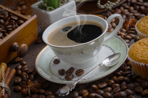 Black coffee on an old background in a cup