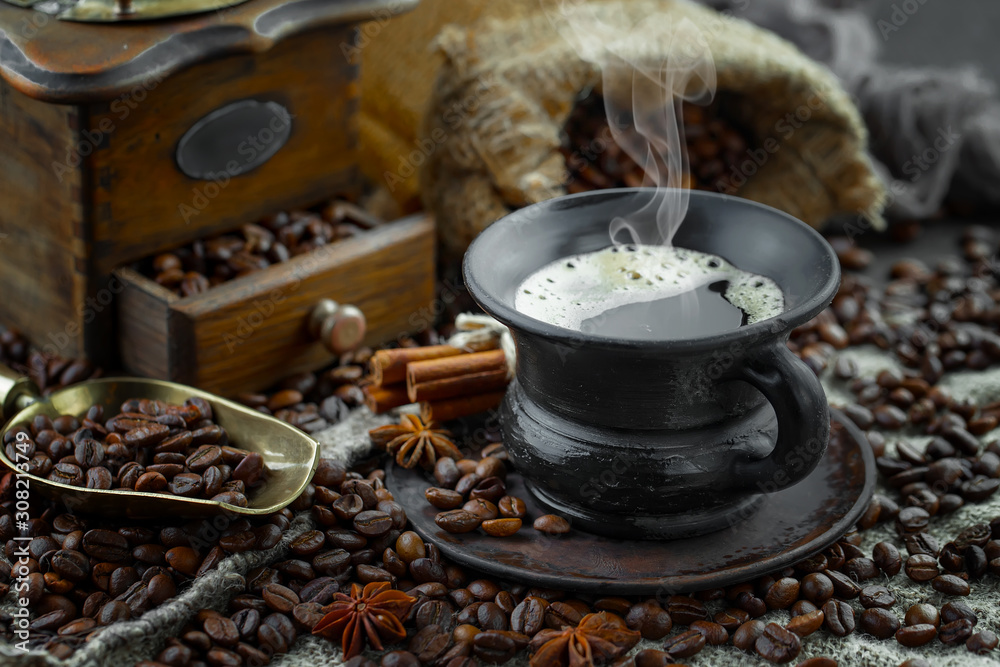 Black coffee on an old background in a cup