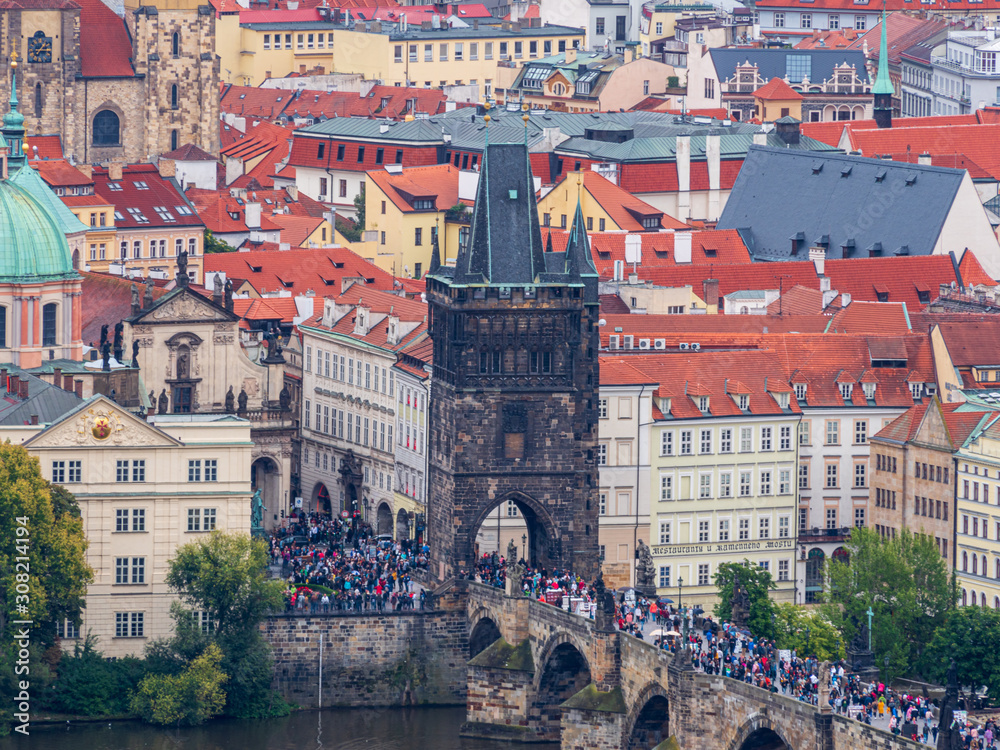 Obraz premium Praha City vie with old architecture and dark stunning clouds 