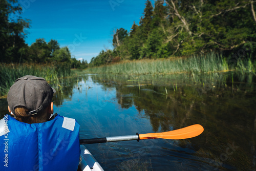Canoe in river peaceful summer day