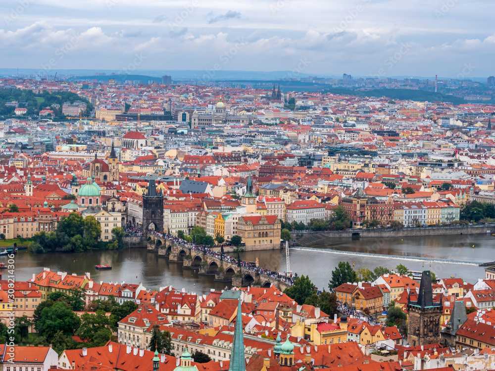Obraz premium Praha City vie with old architecture and dark stunning clouds 