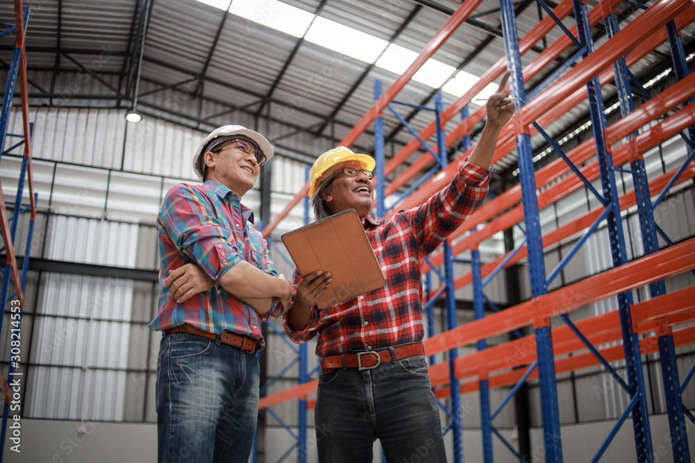 Asian Engineer man working in building factory