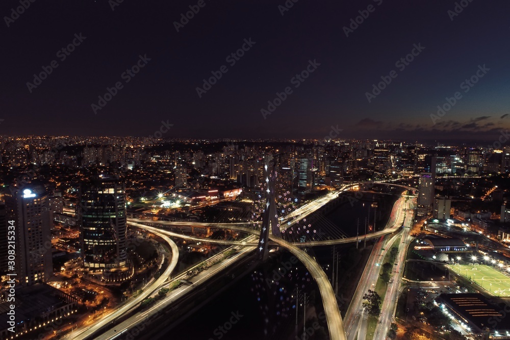 Fototapeta premium Aerial view of famous Estaiada's Bridge decorated for Christmas and New Year Celebrations. Sao Paulo, Brazil