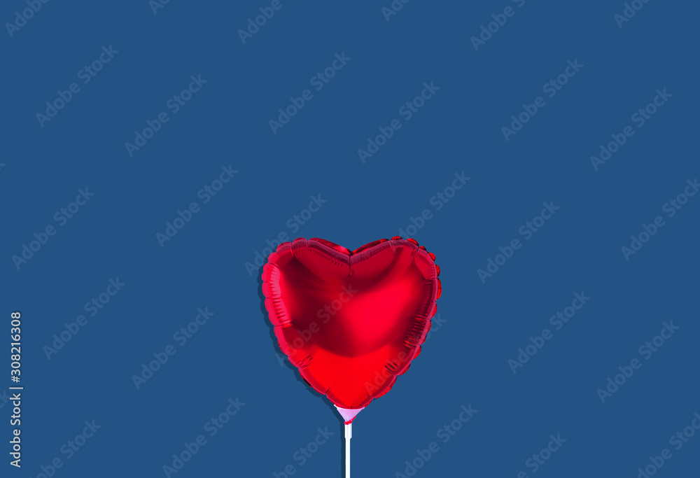 Red heart balloon isolated on trendy background.