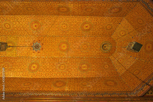 Detail of the Beautifully decorated ceiling in the reception hall in the Bahia Palace in Marrakech