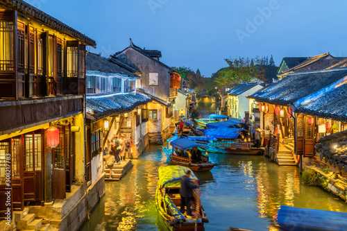 At night, the streets of Zhouzhuang Ancient Town, Suzhou, China photo