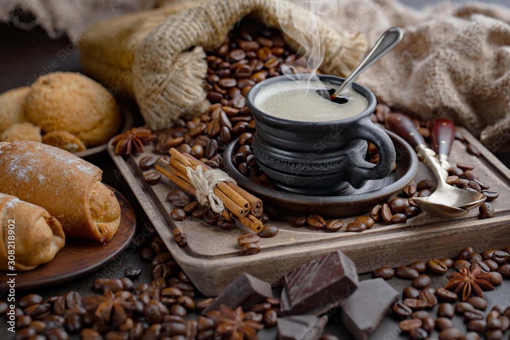 Black coffee on an old background in a cup Black coffee on an old background in a cup