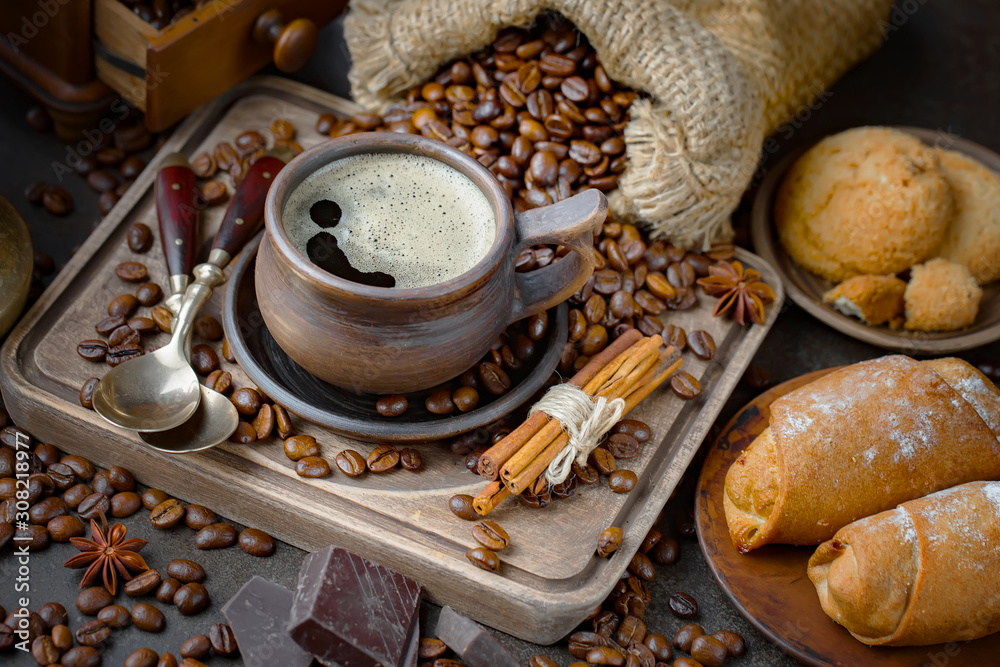 Black coffee beans on an old backgroundм Black coffee beans on an old backgroundм
