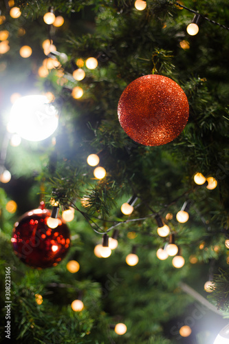 Christmas tree decorated with bulbs, beautiful.