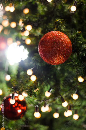 Christmas tree decorated with bulbs, beautiful.