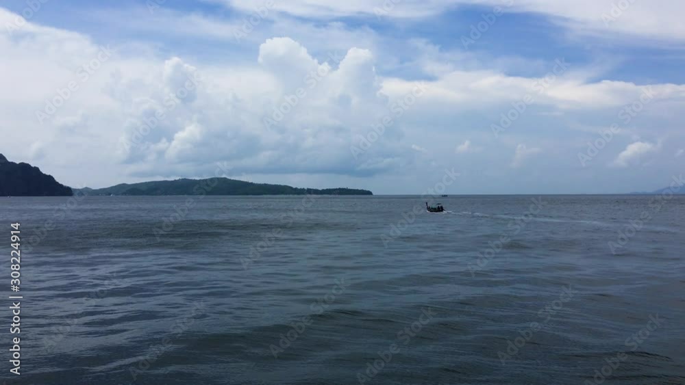 Koh Phi Phi, Thailand. Boat Crossing Andaman Sea From Right To Left. Koh Phi Phi, Thailand. Boat Crossing Andaman Sea From Right To Left.