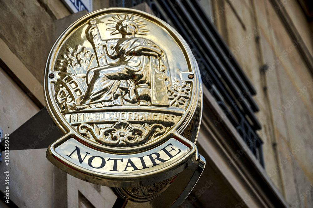 Notary sign in Paris, France.