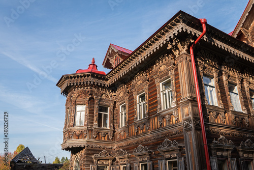 The upper part of the facade of an old wooden house © ptashkan
