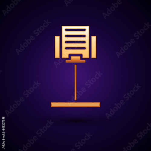 Gold Music stand icon isolated on dark blue background. Musical equipment. Vector Illustration