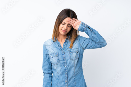 Young woman over isolated white background with tired and sick expression