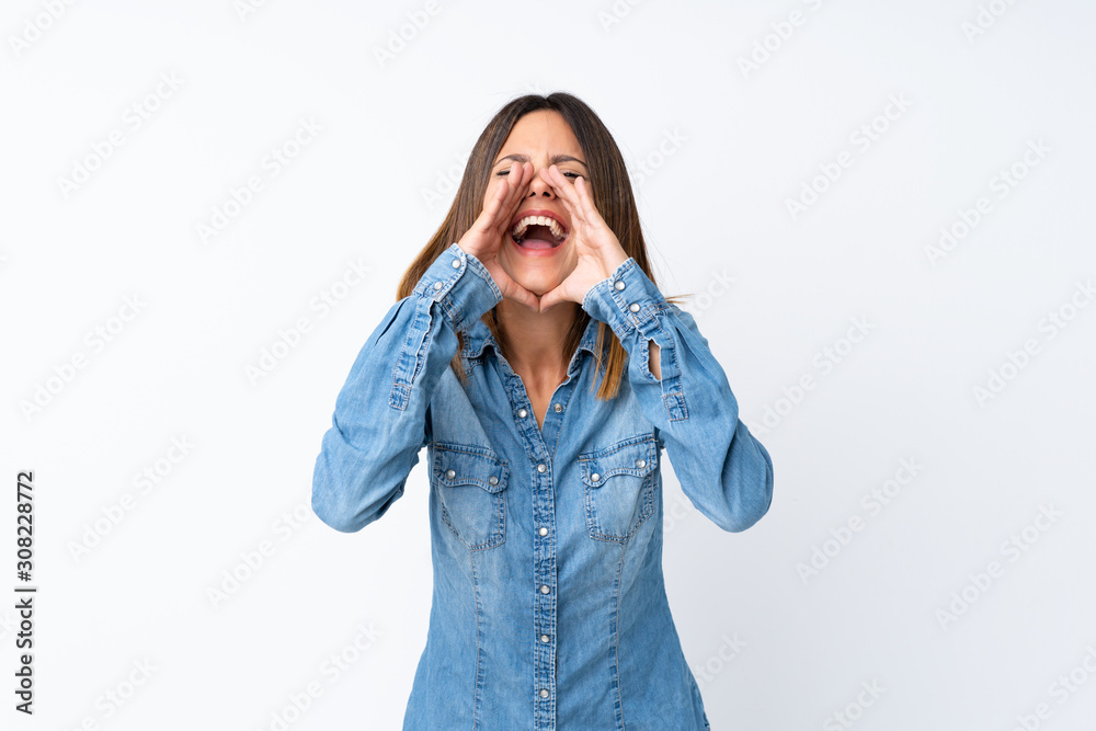 Young woman over isolated white background shouting and announcing something Young woman over isolated white background shouting and announcing something