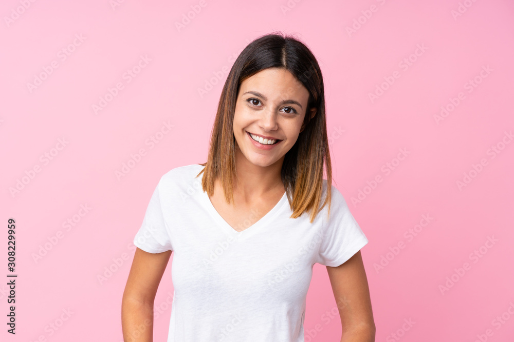 Young woman over isolated pink background laughing Young woman over isolated pink background laughing