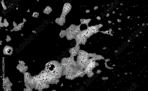 Soap foam isolated on black, with clipping path, texture and background, top view