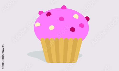 Pink cupcake with icing and sprinkles 