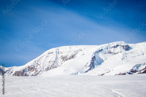 Magnificent view of the snow-white tall mighty mountains Elbrus  ski resort  the Republic of Kabardino-Balkaria  Russia