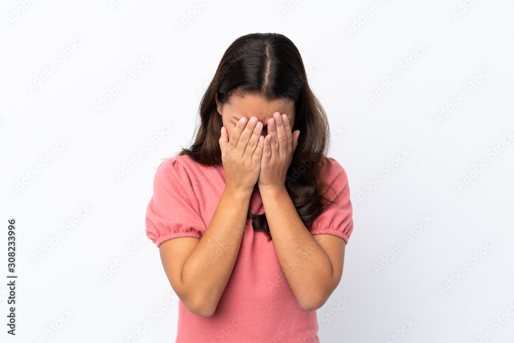 Young Colombian girl over isolated white background with tired and sick expression Young Colombian girl over isolated white background with tired and sick expression