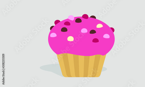cupcake with pink icing and sprinkles