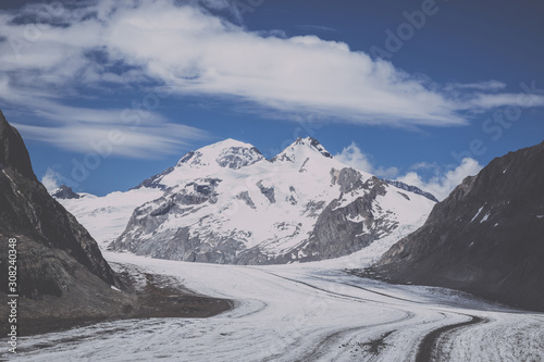 Panorama of mountains scene, walk through the great Aletsch Glacier © TravelFlow